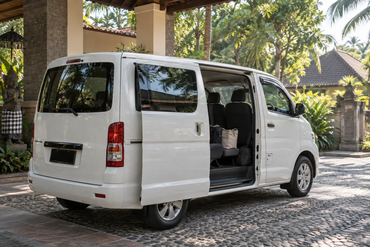 White passenger van ready for a family pickup in Bali